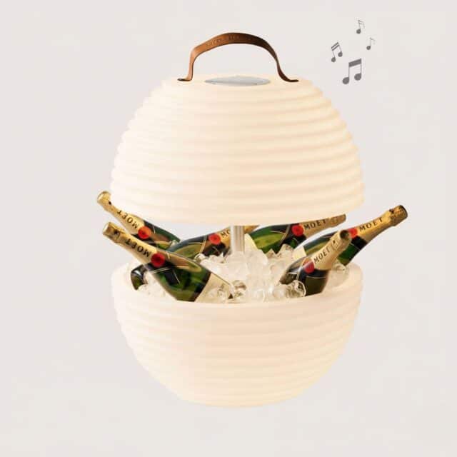 large wine cooler for several bottles including speaker and multicolour lighting